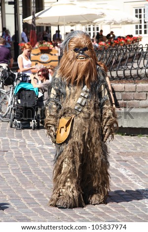 WARSAW, POLAND - JUNE 16: Chewbacca, the hero of Star Wars film, walking the streets of Warsaw, greeting fans who came to the Euro 2012, on June 16, 2012 in Warsaw, Poland.