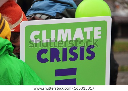 WARSAW - NOVEMBER 11: Climate crisis banner - people demonstrate in the Polish capital during the United Nations climate change conference on November 11, 2013 in Warsaw, Poland.