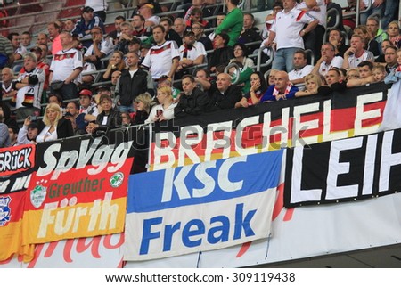 WARSAW, POLAND - OCTOBER 11, 2014: German football fans during the UEFA EURO 2016 qualifying match of Poland vs. Germany.