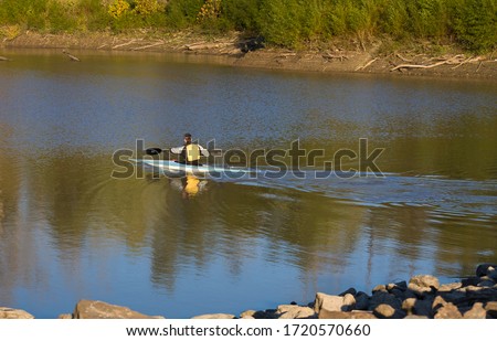 Man kyaking on the missouri river Stok fotoğraf © 