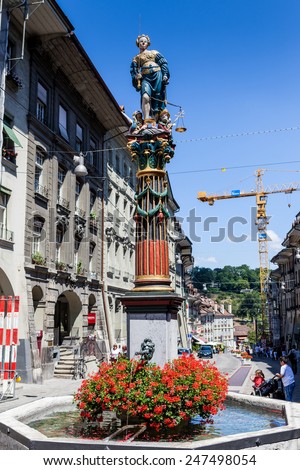 BERN, SWITZERLAND - JULY 18: Capital city of Bern with view to the ZÃ?Â¤hringer fountain  on July 18, 2010. With a population of 138,809 (October 2014), is the fourth most populous city in Switzerland.