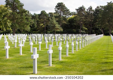 NORMANDY AMERICAN CEMETERY, COLLEVILLE-SUR-MER, FRANCE - AUGUST 23: View to the American Memorial cemetery in Normandy on August 23, 2014. It honours American troops who died during World War 2.