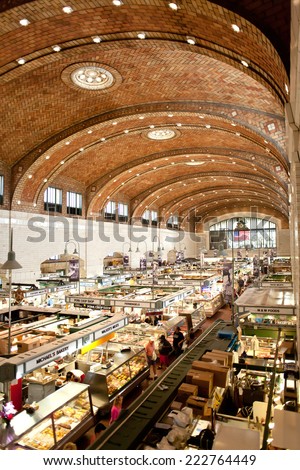 CLEVELAND, OH - AUGUST 6, 2014: Customers and tourists shopped at West Side Market in Cleveland, Ohio in the late morning, West Side Market is opened for shopping since 1912