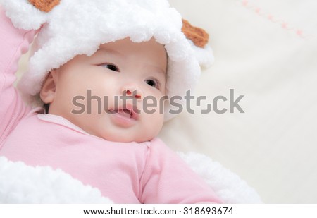 Cute Baby in baby cocoon or sleeping  bag, baby sleeping in Baby crib,vintage and soft picture style