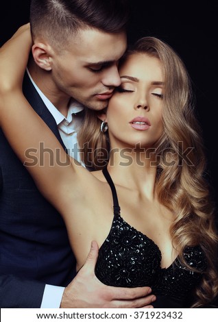 https://image.shutterstock.com/display_pic_with_logo/2641528/371923432/stock-photo-fashion-studio-photo-of-beautiful-sexy-couple-in-elegant-clothes-love-story-valentine-s-day-371923432.jpg
