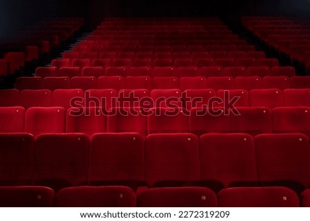 Similar – Image, Stock Photo a row of empty red velvet armchairs inside an auditorium.