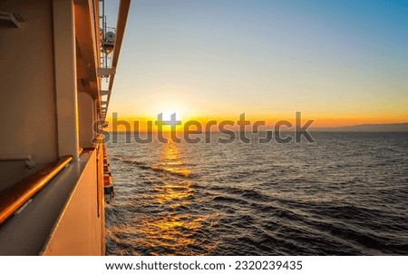 Similar – Image, Stock Photo Sunset with cruise ship and mountains, evening sky in Motor bay