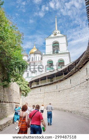 Pskov, Russia - July 5, 2015 Tourists near the Kremlin wall