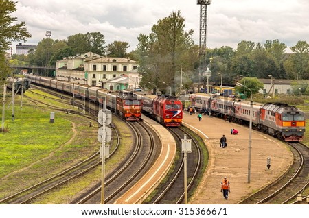 PSKOV, RUSSIA - SEPTEMBER 4, 2015: Passengers await boarding the train on the station platform on September 4, 2015 in Pskov.