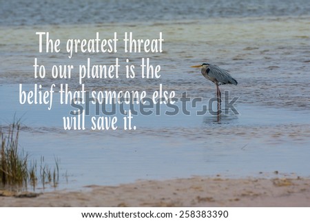 Great blue heron at Cape San Blas Florida beach with nature quote greatest threat to our planet is believing someone else will save it.