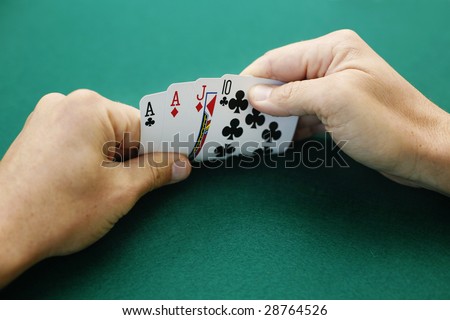 Ace Ace Jack Ten Double Suited. Premium starting hand in Omaha High Low poker.