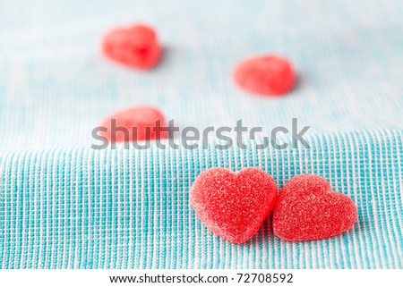 Heart shape candy for Valentine's day on a light blue background