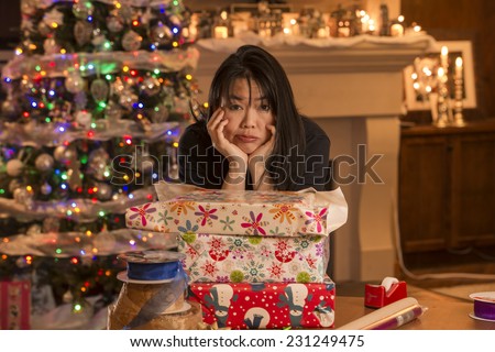 frazzled woman\'s gifts / looks like they are for christmas / judging by decor