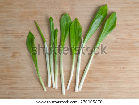 Leaves of wild garlic on a chopping board