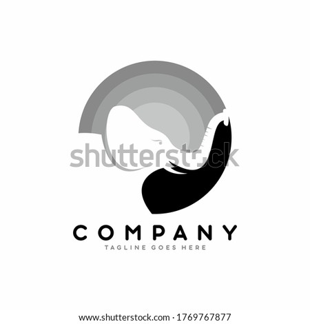 Negative space elephant circle logo template black and grey