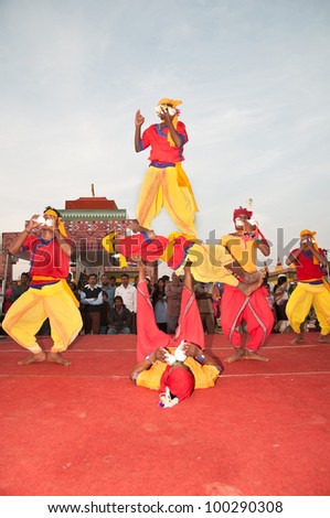BHUBANESWAR, INDIA - DECEMBER 22: Tribal dancers perform at the Toshali National Crafts fair on December 22, 2011 in Bhubaneswar, Orissa, India. Toshali is the largest art and crafts fair in India.