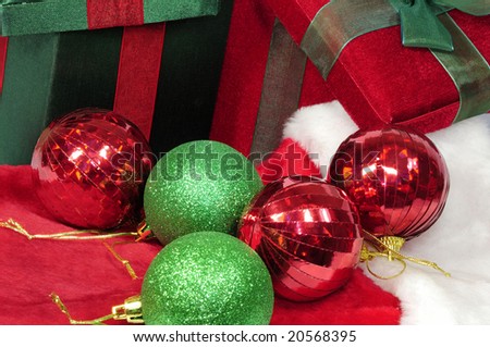 Christmas gift boxes on sock with decorations and little bells and jewels