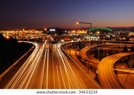 Seattle freeways with colorful streaks of light from fast moving traffic