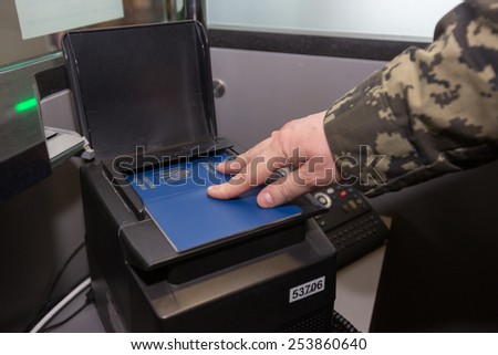 BORYSPIL, UKRAINE - FEBRUARY, 18, 2015: Specialists of the State Border Guard Service of Ukraine show the system biometric passports control at the airport \