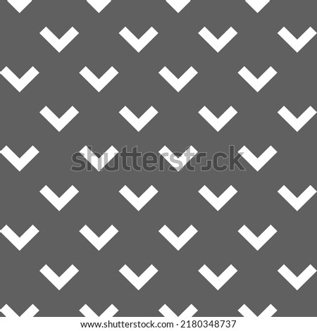 Vector. Grey and white abstract ethnic seamless pattern. Background of angle brackets. Mosaic. Design of packaging paper, textile printing, web design, cover, advertising and typographic products.