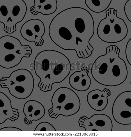 Vector illustration. Seamless pattern of large and small human skulls, hand drawn. Repetitive wallpaper of bones. Creepy evil Halloween background. The day of the Dead. Design of wrapping, gift paper.