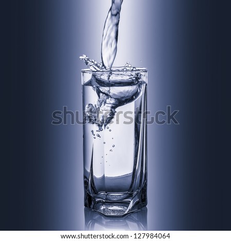 Crystal clear water fills a glass - Stock Image - Everypixel