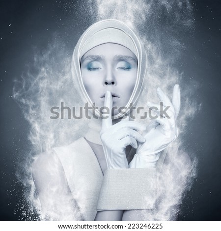 glamor portrait of a girl wrapped in a loop of the particles