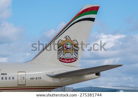 MANCHESTER, UNITED KINGDOM - MAY 04, 2015: Etihad Airlines Boeing 777 tail livery at Manchester Airport May 04 2015.