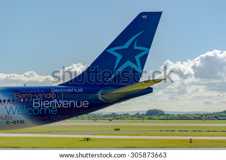 MANCHESTER, UNITED KINGDOM - AUG 07, 2015: Air Transat Airbus A330 tail livery at Manchester Airport Aug 07 2015.