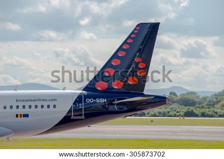 MANCHESTER, UNITED KINGDOM - AUG 07, 2015: Brussels Airlines Airbus A319 tail livery at Manchester Airport Aug 07 2015.