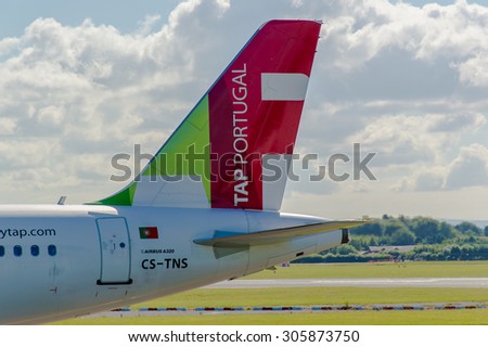 MANCHESTER, UNITED KINGDOM - AUG 07, 2015: Air Portugal (TAP) Airbus A320 tail livery at Manchester Airport Aug 07 2015.
