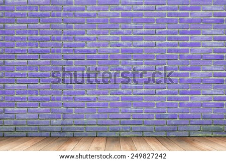 interior room with beautiful violet brick wall and wooden floor
