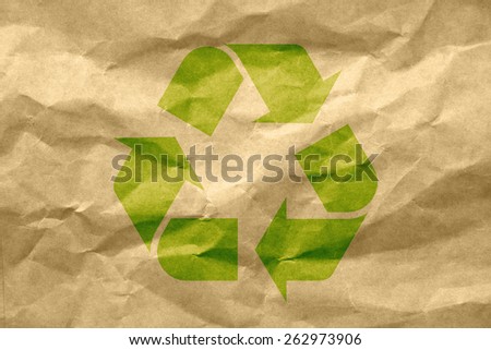 recycle logo on recycled paper