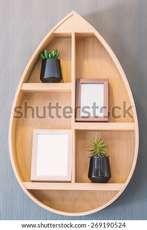 Wooden shelves and closet in living room
