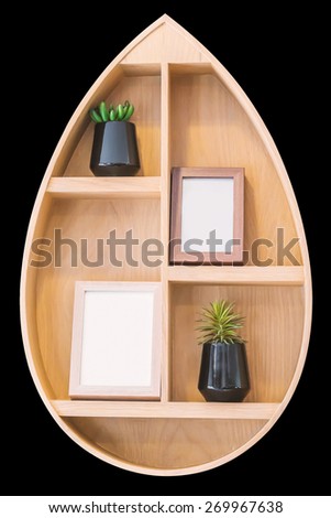 Wooden shelves on black background
