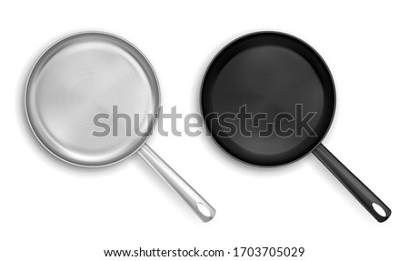 Metal and black nonstick frying pans top view. Vector realistic mockup of empty steel skillet with handle. Stainless pan, kitchen utensil for cooking food isolated on white background