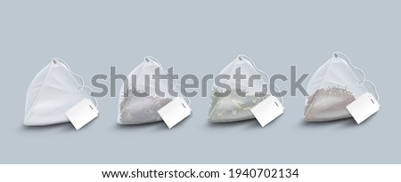 Pyramid shape tea bags with leaves and herbs