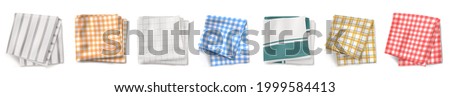 Kitchen towel or tablecloth top view. Folded textile with chequered and lined print. Picnic napkin, gingham cotton linen or plaid design isolated on white background, Realistic 3d vector illustration Stok fotoğraf © 