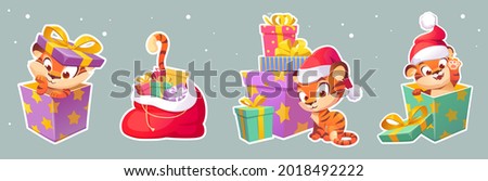 Set of stickers New Year tiger in Santa hat, 2022