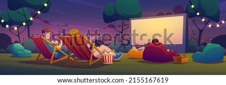 Night open air cinema on lawn in city park, garden or backyard. Vector cartoon summer landscape with empty outdoor movie theater with big screen, chaises, picnic baskets and lightbulb garland