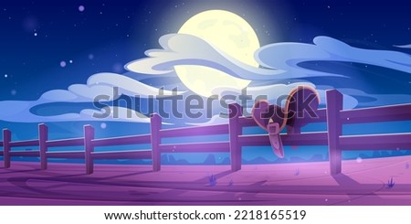 Western country landscape with horse saddle on wooden fence at night. Vector cartoon illustration of wild west desert, american ranch with cowboy saddle, paddock wood fence and full moon in sky