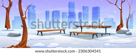Snowy winter in urban park. Vector cartoon illustration of public garden landscape with wooden table, benches, leafless trees and bushes covered with snow, silhouettes of city buildings on background