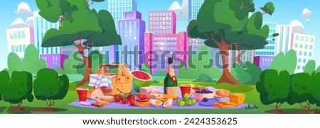 Picnic in summer city park. Vector cartoon illustration of basket with food and drink, fresh fruit and vegetables on blanket, modern cityscape with skyscrapers, green lawn, bushes and trees, blue sky