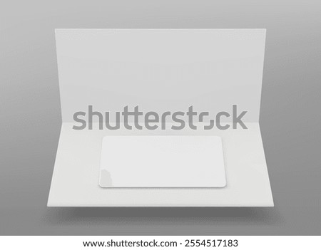 White plastic gift card in folded paper package. Minimal setup for showcasing loyalty, banking, membership or discount cards. Empty template for branding. Elegant mockup of certificate in holder.