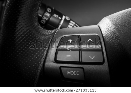 Volume and telephone command, Close up image of steering wheel of modern car.