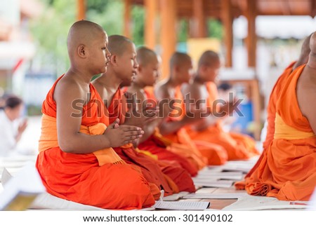 KAMPHAENG PHET, THAILAND-JULY 30 ,2015 : Novice of Thailand assembled religious rituals in the Day before the Buddhist Lent at Wat Phra Borommathat in Kamphaeng phet ,JULY 30,2015 ,Thailand.