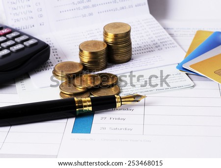 Close up for Fountain pen and money coins stack for loan money concept