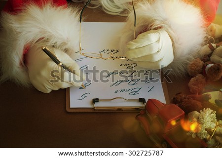 Santa with Christmas letter or wish list