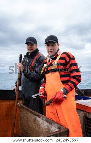 Similar – Image, Stock Photo two fishermen in a boat with reflection in a still river water at twilight on autumn landscape.