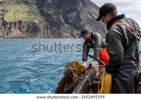 Similar – Image, Stock Photo Fisherman fishing at the sea.